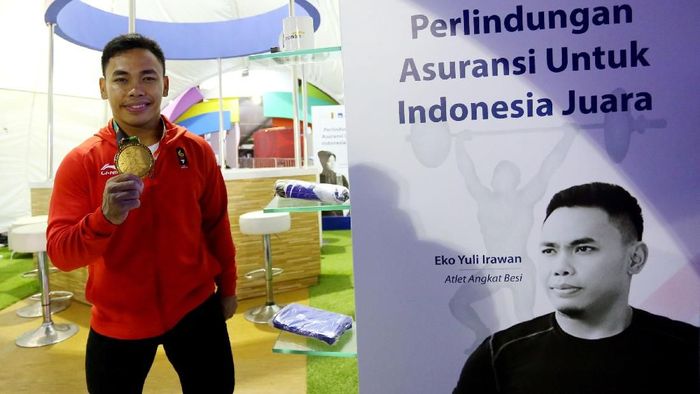 Eko Yuli Irawan bakal ikut kejuaraan dunia angkat besi di China 20-25 Februari (dok. AXA Mandiri) Eko Yuli Irawan bakal ikut kejuaraan dunia angkat besi di China 20-25 Februari (dok. AXA Mandiri)