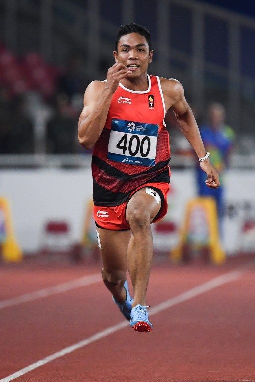 Indonesia's Lalu Muhammad Zohri competes in a heat of the men's 100m athletics event during the 2018 Asian Games in Jakarta on August 25, 2018. / AFP PHOTO / Jewel SAMAD