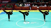Nugraha, Sani Asep Yuldan, dan Mubarok Anggi Faisal mempersembahkan medali emas teranyar buat Indonesia saat turun dalam cabang Pencak Silat nomor seni beregu putra Asian Games 2018.
