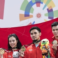 Lindswell Kwok atlet wushu yang berhasil meraih emas di Asian Games 2018 diketahui menjalin hubungan asmara dengan Achmad Hulaefi, yang juga atlet wushu. Keduanya pun sudah berpacaran sejak 2015 hingga kini. Foto: Antara