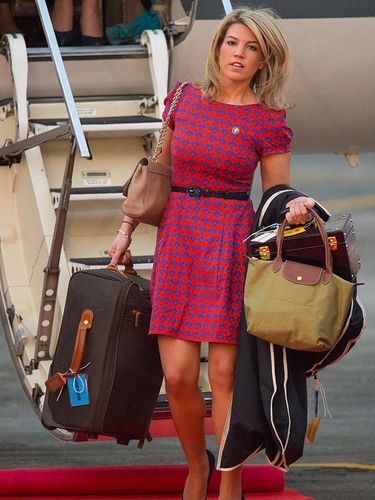 ASSAM, INDIA - APRIL 12: The Duchess of Cambridge's PA and Stylist Natasha Archer carries items of luggage as she arrives at Tezpur Airport on April 12, 2016 in Assam, India. The Duke and Duchess of Cambridge are on a week-long tour of India and Bhutan taking in Mumbai, Delhi, Assam, Bhutan and Agra. (Photo by Dominic Lipinski - Pool/Getty Images)