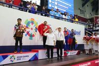Menko Puan Maharani dalam pertandingan Pencak Silat Asian Games 2018 (Foto dok. Kemenko PMK)