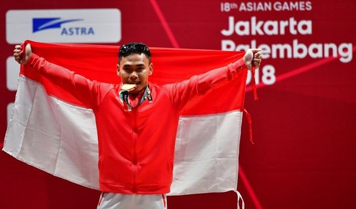 Eko Yuli Irawan membidik medali emas Olimpiade 2020. (Foto: Money Sharma/AFP Photo) Eko Yuli Irawan membidik medali emas Olimpiade 2020. (Foto: Money Sharma/AFP Photo)