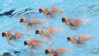 Karena beraksi di dalam dan bawah air, olahraga ini menuntut kekuatan fisik yang ekstra. (Lintao Zhang/Getty Images)
