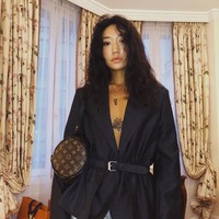 Peggy memiliki wajah cantik khas Korea. Dia pun memiliki sejumlah tato di tubuhnya, yang paling terlihat adalah di sepanjang lengannya.  Foto: dok. Instagram (@peggygou_)