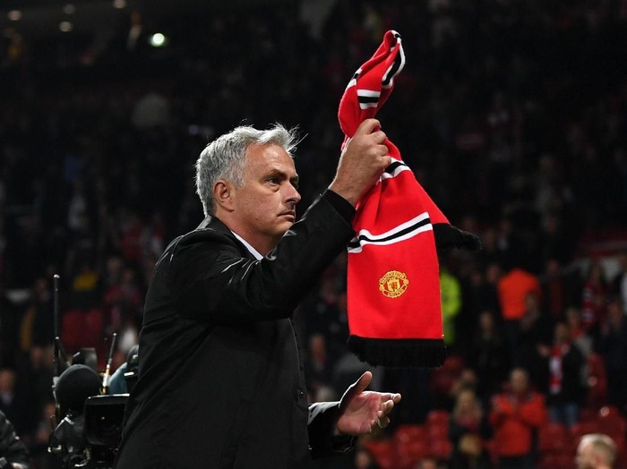 MANCHESTER, ENGLAND - AUGUST 27: Jose Mourinho, Manager of Manchester United applauds fans after the Premier League match between Manchester United and Tottenham Hotspur at Old Trafford on August 27, 2018 in Manchester, United Kingdom. (Photo by Michael Regan/Getty Images)