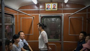 Saat berada dalam kereta. Foto: Carl Court / Getty Images