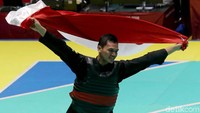 Lagi, medali emas kembali diperoleh Indonesia lewat Aji Bangkit Pamungkas yang menjadi juara di nomor tarung putra kelas I. Agung Pambudhy/detikcom.