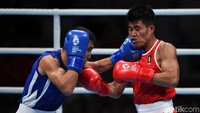 Dalam laga semifinal yang dilangsungkan Jumat (31/8/2018) sore WIB, dia kalah dari petinju Uzbekistan, Miraziznek Mirzakhalilov.