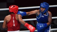 Huswatun Hasanah kalah di semifinal tinju putri dan meraih perunggu Asian Games 2018. Pencapaiannya itu sudah mengukir sebuah rekor baru buat Indonesia.
