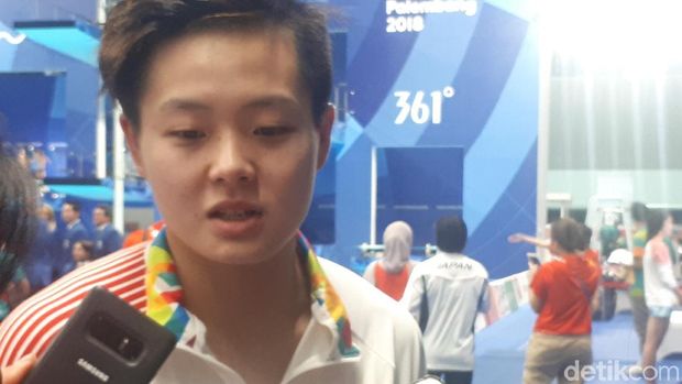 Atlet loncat indah China Yiwen Chen.