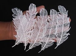 Karya Seni Luar Biasa dari Potongan Kertas Putih