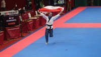 Atlet Taekwondo putri Indonesia Defia Rosmaniar menjadi menyumbang emas pertama untuk Indonesia. Grandyos Zafna/detikcom.