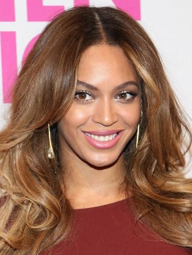 Inilah penampilan Beyonce di 2014. Dari tahun ke tahun, wajah dan ekspresi Beyonce tetap sama.  Foto: Getty Images
