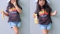 Savanna tampil cantik nih saat makan es krim. Posenya sudah kayak model nih. Foto: instagram @dirasugandi