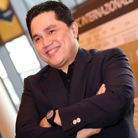 Misteri ketua tim sukses Joko Widodo dan Maruf Amin untuk pemilihan presiden 2019 akhirnya terjawab sudah. Mandat tersebut jatuh ke tangan Erick Thohir. Pengusaha yang juga ketua panitia Asian Games 2018 (Inasgoc) ini kerap tampil necis dalam balutan jas. Seperti di foto ini, Erick mengandalkan setelan serba hitam saat menghadiri sebuah acara di Singapura Juli tahun lalu. (Foto: Getty Images)