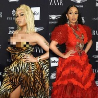 Nicki Minaj dan Cardi B pernah muncul beberapa kali di karpet merah yang sama. Mereka pun berlomba-lomba mencuri perhatian dengan pakaian mereka yang seksi, provokatif, dan ekstentrik. (Foto: Getty Images)