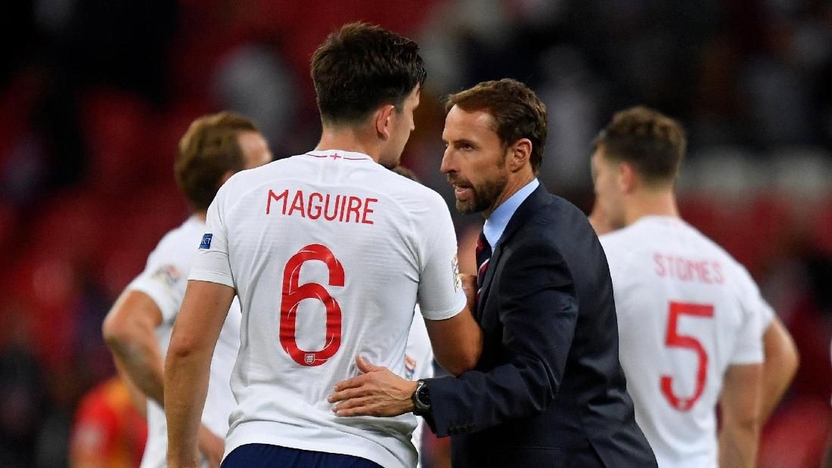 Harry Maguire dan Gareth Southgate. (Foto: Toby Melville/Reuters)