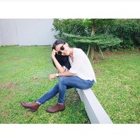 Senyuman Tania yang terlihat manis. Foto: Instagram