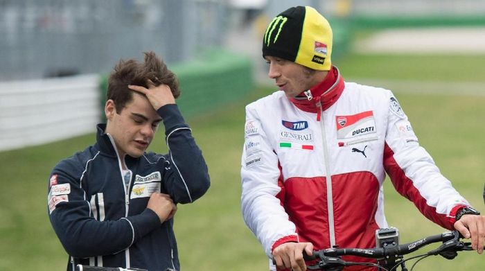 Romano Fenati dan Valentino Rossi pada tahun 2012 silam (Foto: Mirco Lazzari gp/Getty Images) Romano Fenati dan Valentino Rossi pada tahun 2012 silam (Foto: Mirco Lazzari gp/Getty Images)