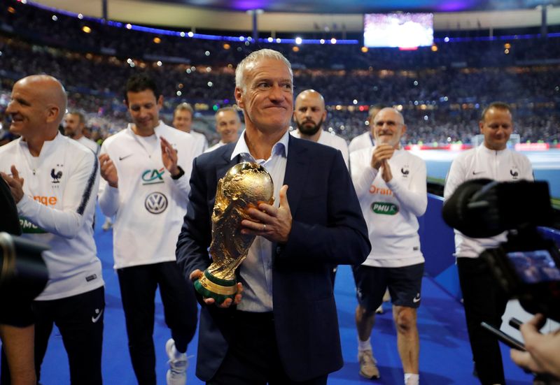 Soccer Football - UEFA Nations League - League A - Group 1 - France v Netherlands - Stade de France, Saint-Denis, France - September 9, 2018  France coach Didier Deschamps celebrates with the World Cup trophy during a ceremony after the match  REUTERS/Charles Platiau