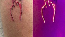 Keren! Bukan sekadar tato biasa, tato UV ini bisa menyala saat disinari sinar ultraviolet. Tinta fluoresens membuat tato-tato lucu ini berbeda.