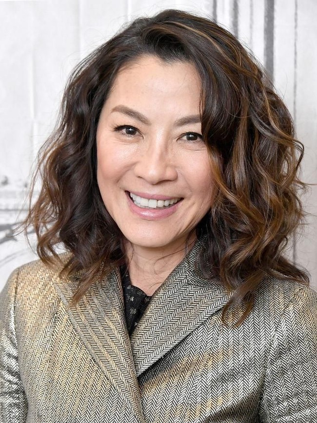 Michelle lahir di Ipoh, Malaysia. Setelah membintangi sejumlah film Mandarin, namanya mulai go international setelah muncul di beberapa film Hollywood. Salah satunya seri James Bond, Tomorrow Never Dies. (Foto: Getty Images)
