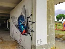 Keren Banget! Seni Grafiti 3D Ini seperti Keluar dari Tembok