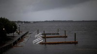 Sebuah dermaga yang rusak oleh banjir dari Sungai Neuse akibat Badai Florence di New Bern, North Carolina, Amerika Serikat. Eduardo Munoz/Reuters.