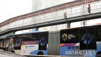 Seperti tak bisa move on dari perhelatan Asian Games 2018 yang sudah lalu, Tapi semua bahan promosinya masih terpasang di JPO Harmoni.  