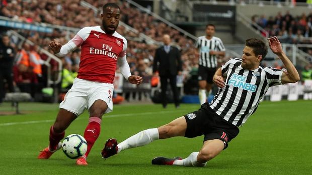 Arsenal sempat kesulitan menembus pertahanan Newcastle di babak pertama.