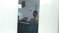 Muhir kini meringkuk di sel tahanan. Tampak saat ia diperiksa tim kejaksaan.