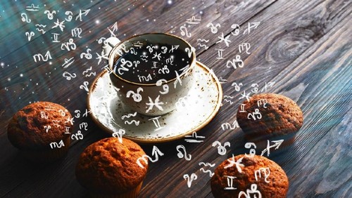 Rear View Of Young Woman Looking In Fridge At Kitchen
