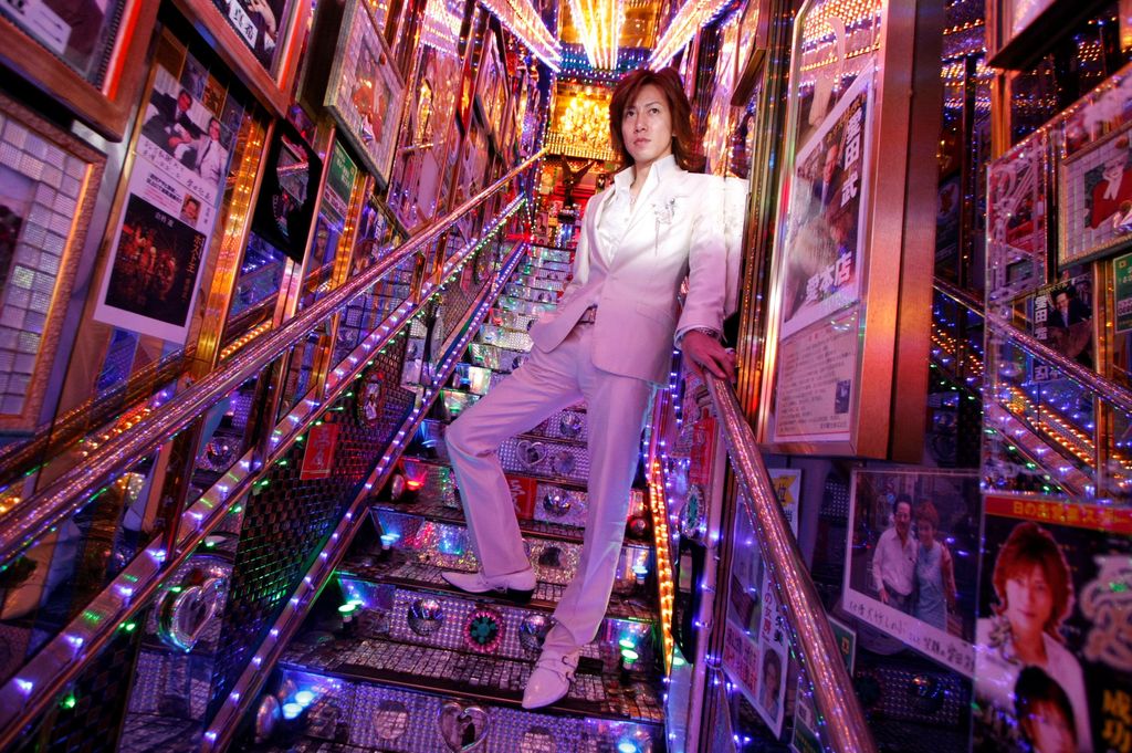 Hikaru Aizawa, who entertains female customers as a host in a club in Tokyo's red light district, poses for a photograph at his host club in Tokyo's Kabukicho nightlife district, Japan, June 25, 2009. REUTERS/Toru Hanai      SEARCH 