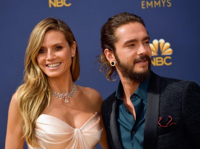 Romansa keduanya mulai terkuak ketika mereka kedapatan berciuman di lokasi syuting Americas Got Talent Maret lalu. Sebelumnya, Heidi bersuamikan penyanyi Seal. Namun, pernikahan 9 tahun mereka kandas dengan perceraian. (Foto: Matt Winkelmeyer/Getty Images)