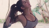 Dalam akun Instagram-nya, ia kerap mengunggah foto sedang melakukan yoga. (Foto: Instagram/bellashofie5292)