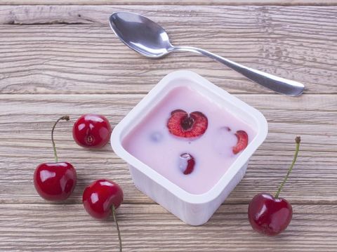 Girl eating yogurt