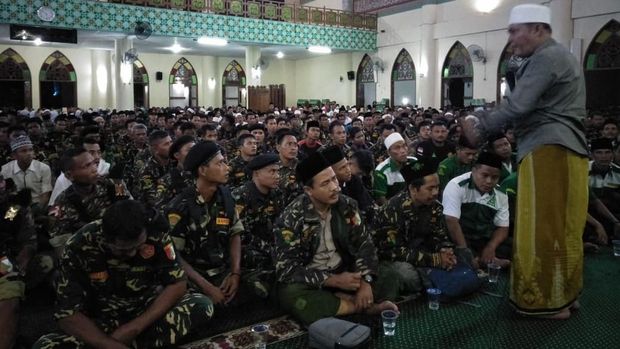 Ribuan anggota Ansor dan Banser memadati Masjid Islamic Center Sultan Syarif Hasim, Kabupaten Siak, Riau, untuk berzikir dalam acara Haul Sultan Siak.