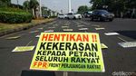 Aksi Unjuk Rasa Hari Tani Nasional di Bawah Terik Matahari