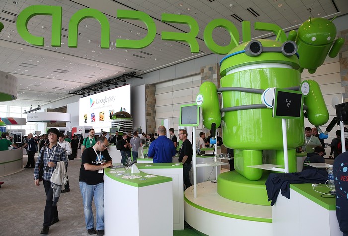 SAN FRANCISCO, CA - MAY 15:  Attendees visit the Android booth during the Google I/O developers conference at the Moscone Center on May 15, 2013 in San Francisco, California. Thousands are expected to attend the 2013 Google I/O developers conference that runs through May 17. At the close of the markets today Google shares were at all-time record high at $916 a share, up 3.3 percent.  (Photo by Justin Sullivan/Getty Images)
