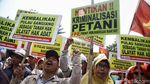 Aksi Unjuk Rasa Hari Tani Nasional di Bawah Terik Matahari