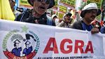 Aksi Unjuk Rasa Hari Tani Nasional di Bawah Terik Matahari