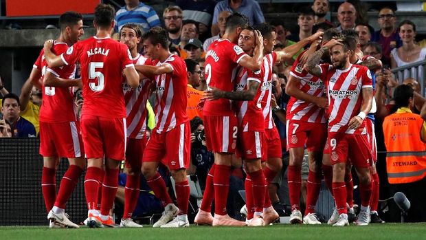 Pemain Girona merayakan gol yang dicetak Stuani.