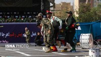 Menurut keterangan Gubernur Khuzestan, Gholam-Reza Shariati, para teroris menyamar sebagai pasukan Korps Pengawal Revolusi Islam (IRGC) dan sukarelawan untuk menembaki pihak berwenang dan orang-orang dari belakang stan selama pawai berlangsung. ISNA Photo/via Reuters.