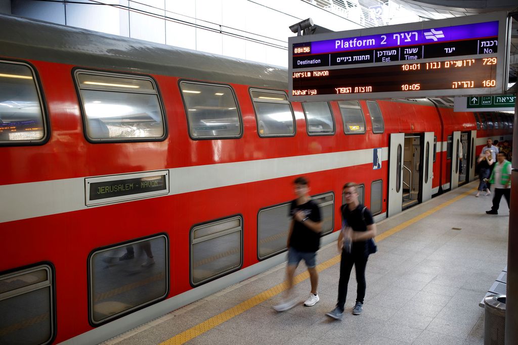 People walk on the platform at Israel's new high-speed rail line station at Ben Gurion International Airport, in Lod, near Tel Aviv September 25, 2018. REUTERS/Amir Cohen