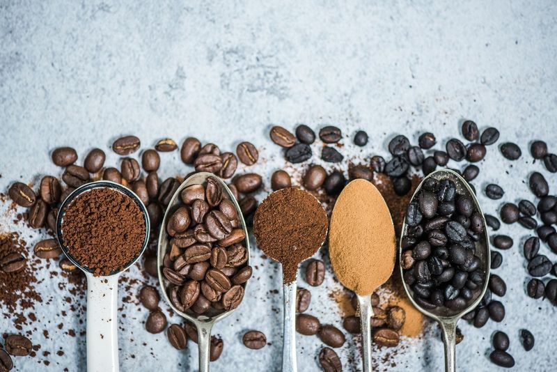 heap of coffee beans isolated on white