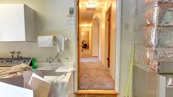 Ini adalah pintu masuk menuju rumah Susan Wojckicki -- kini adalah CEO YouTube -- yang dulu menyewakan garasinya untuk Brin dan Page. Foto: Google