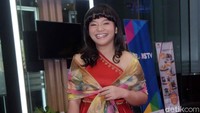 Amel tampil dengan gaun merah. Pool/Noel/detikFoto.
