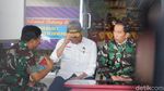 Foto: Jokowi Berjaket Loreng Saat Tiba di Palu