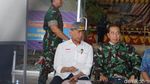 Foto: Jokowi Berjaket Loreng Saat Tiba di Palu
